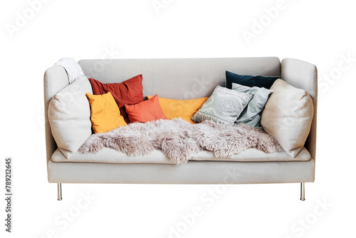 Gray super cozy and comfortable couch with pillows and soft warm fur quilt. Isolated on a white background.