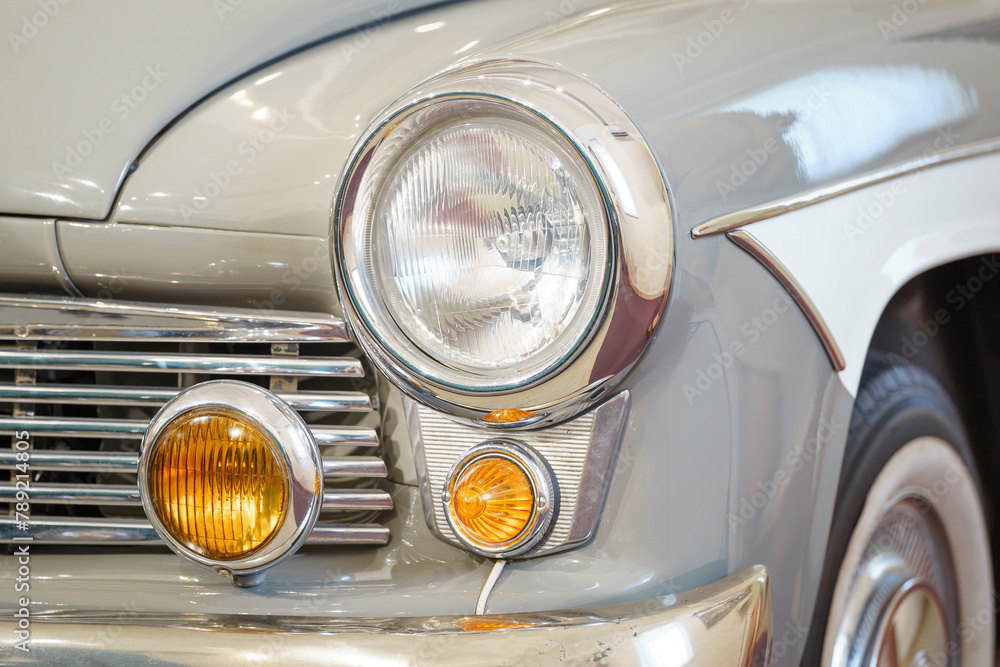 Close up of a vintage car headlight. Classic car.