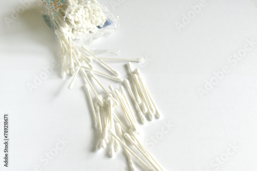 Sticks for cleaning ears on a white background.