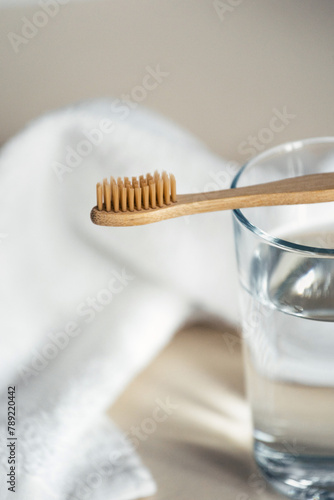 Selective focus on eco friendly wooden brush with soft fiber for sensitive teeth