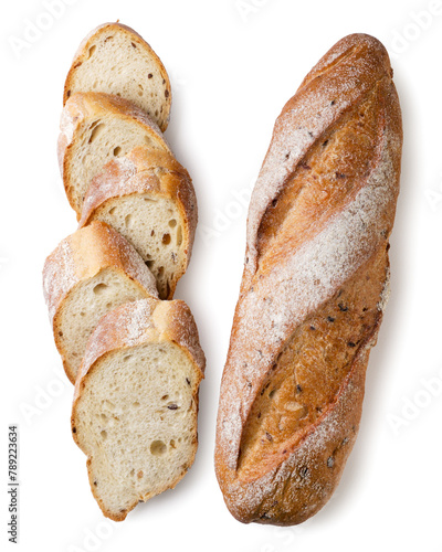 Bread baguette and sliced pieces close-up on a white. Top view