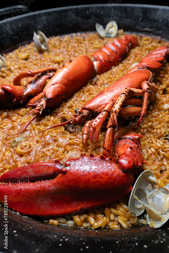 Traditional Valencian seafood paella with rich socarrat photo