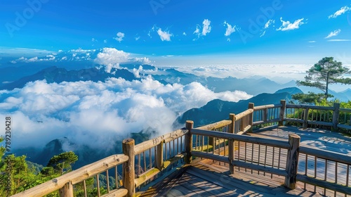 Breathtaking Mountain View with Clouds Below photo