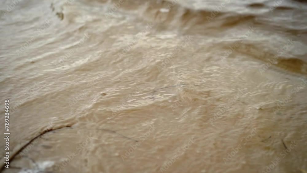 Waves on the river bank.
Waves roll onto the sandy beach Waves on the river bank.
Waves roll onto the sandy beach
