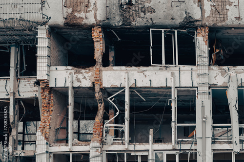 destroyed and burned houses in the city Russia Ukraine war photo