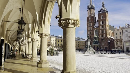 Beautiful Old Town views in Krakow Old Town Square - taken from Cloth Hall with views onto St Mary's Basilica. Krakow, Poland photo