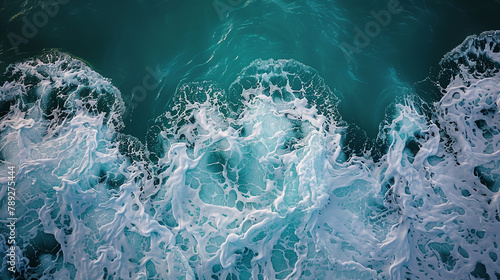 Visual art interpretation: from above of the oceana??s turquoise waters, with foam creating a lace-like texture on the surface. portrayed with creativity. photo