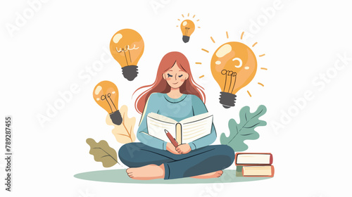 Young girl writing good ideas as light bulbs on paper