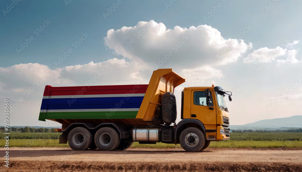 Obraz premium A truck adorned with the Gambia flag parked at a quarry, symbolizing American construction. Capturing the essence of building and development in the Gambia