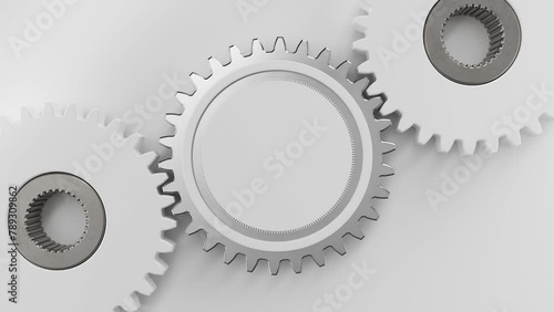 Center Cog wheel white gears in a machine rotating. For Logo title. Gears working in the machinery. Golden white glowing shining. Top view