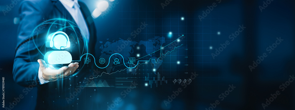 Businessman hand-holding customer support icons with seamless network connection. Facilitating the growth of the customer service and satisfaction for businesses. Businessman hand-holding customer support icons with seamless network connection. Facilitating the growth of the customer service and satisfaction for businesses.