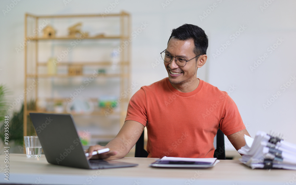 Man working in home office, working at home.