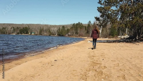 Person on Papineau beach in Ontario, Canada. photo