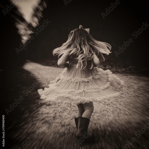 Little girl spinning her dress