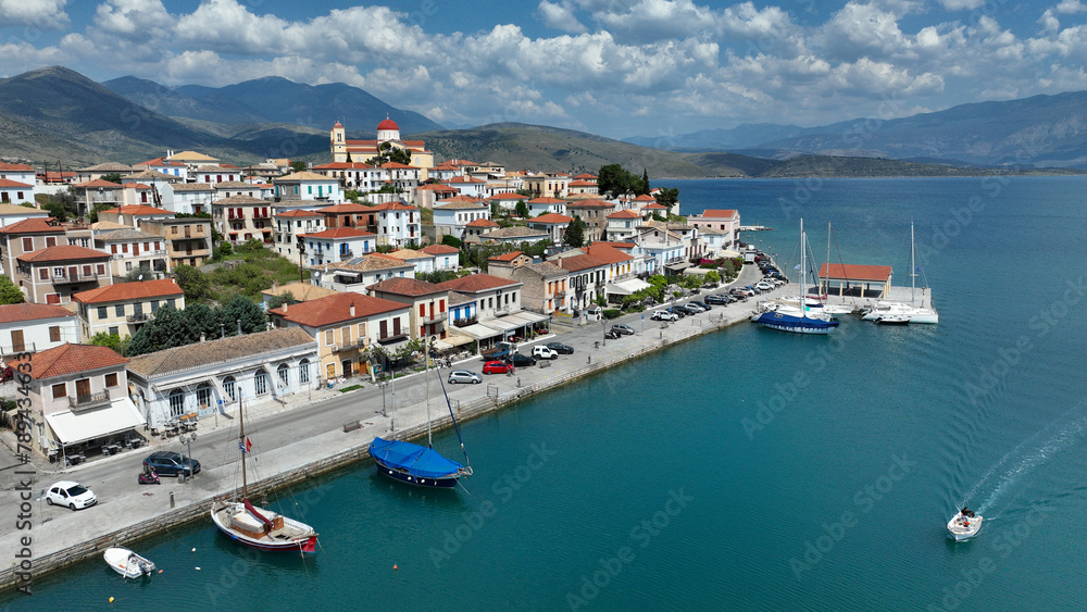 Aerial drone photo of picturesque fishing village of Galaxidi and landmark church of Agios Nikolaos, Fokida prefecture, Greece