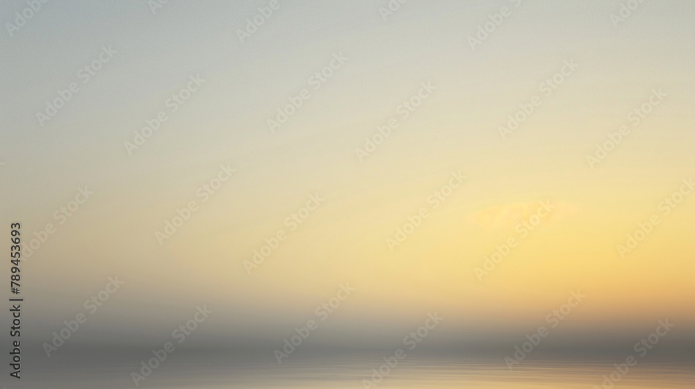 An artistic depiction of a misty gray to a pale yellow, simulating a peaceful dawn in an abstract gradient background. as seen in an image.