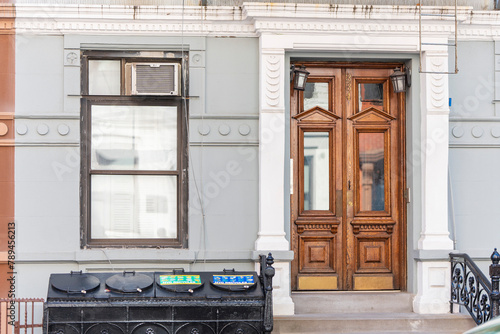 Photography Brownstone building in New York City with wood doors