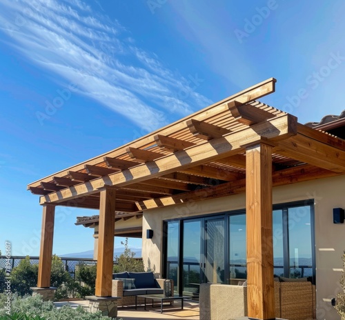 A wooden deck with an attached arbor and roof on the side, patio cover installation, full view of backyard in Colorado