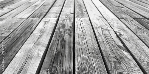 A simple black and white image of a wooden floor. Perfect for adding texture to design projects