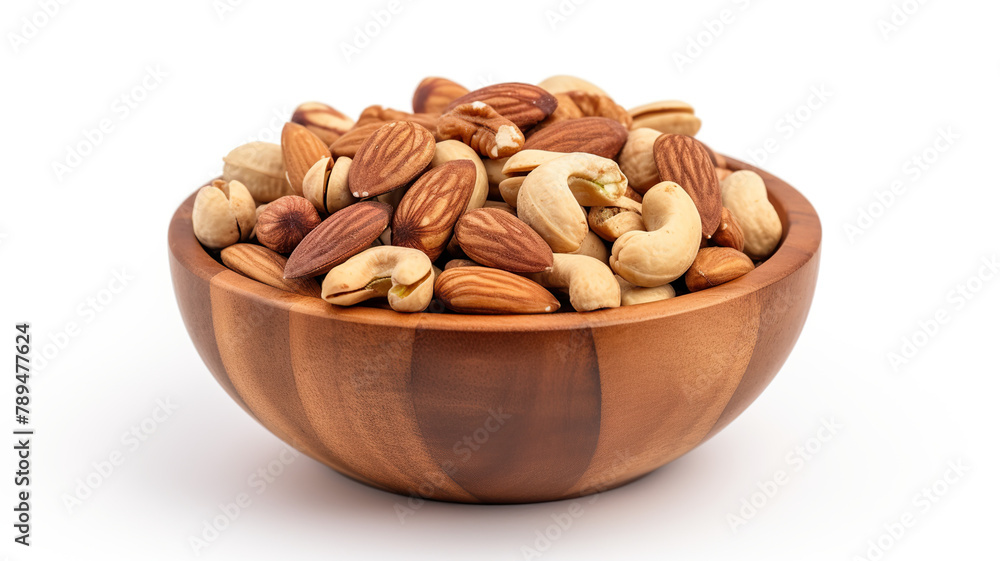 A wooden bowl filled with mixed nuts and linen, isolated on a stark white background A wooden bowl filled with mixed nuts and linen, isolated on a stark white background