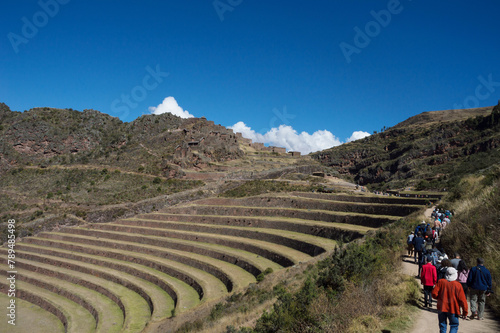 Flow of tourists heading to the ruins complex at the top of the mountain in Pisac