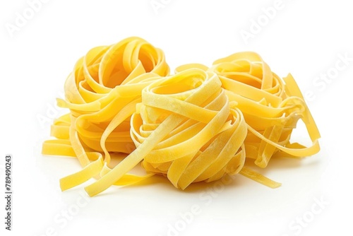 A pile of pasta noodles on a white surface. Perfect for food-related designs