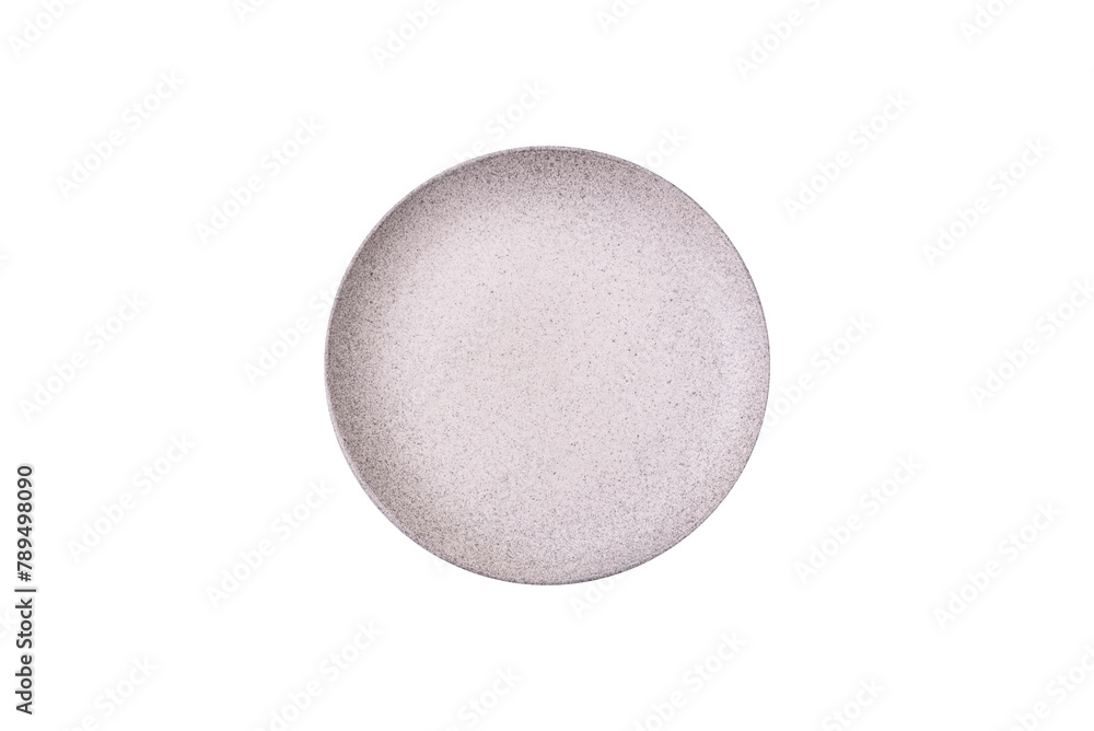 An empty plate on a gray concrete background with copy space An empty plate on a gray concrete background with copy space