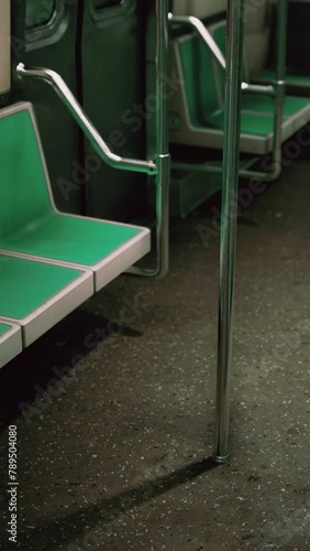Empty benches of metro wagon photo