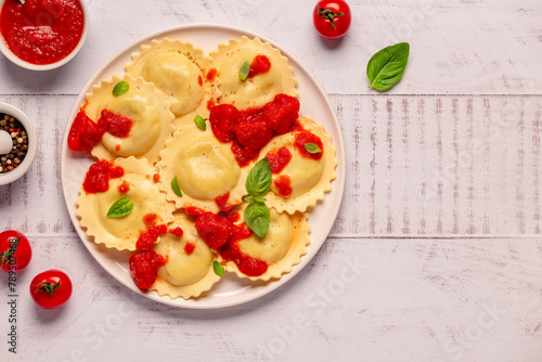 Ravioli with tomato sauce and basil