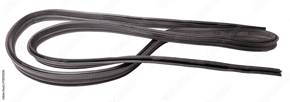 Rolled up black rubber sealant for elements of the car body, doors or trunk, for noise insulation, thermal and sound, preventing heat loss in the car interior. Sealing gasket for repair in a workshop. Rolled up black rubber sealant for elements of the car body, doors or trunk, for noise insulation, thermal and sound, preventing heat loss in the car interior. Sealing gasket for repair in a workshop.