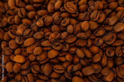 Close-up of freshly roasted coffee beans, medium-light roast. High quality photo