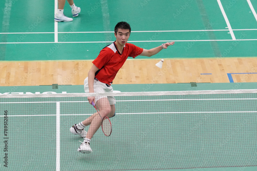 A very focused player who plays single badminton