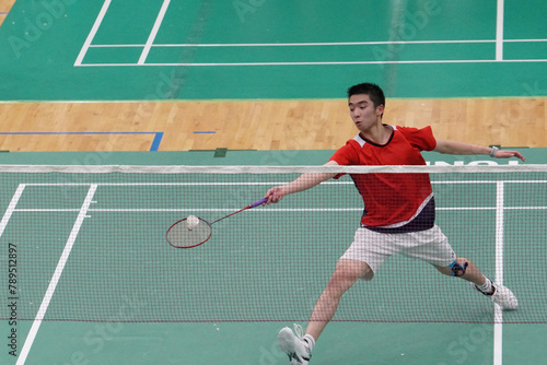 A very focused player who plays single badminton