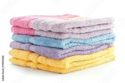 stack of pastel color towels isolated on white background