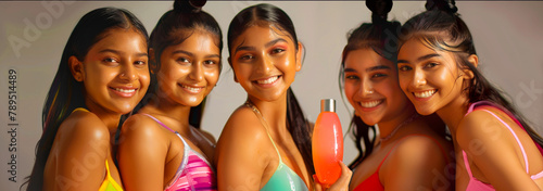 Young Indian Girls in Vibrant Swimwear and Skincare Products 