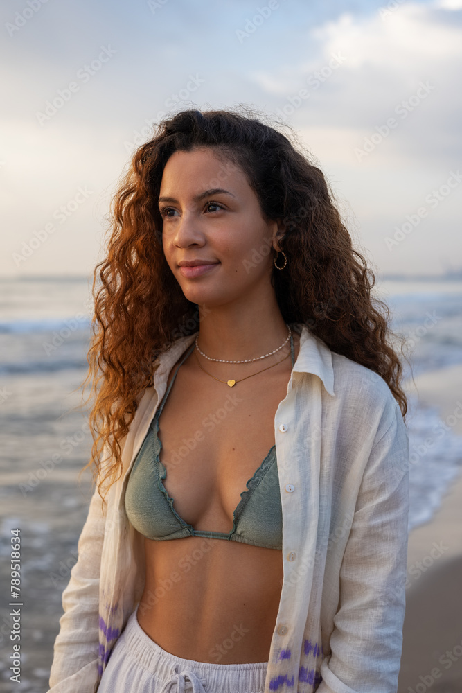 Portrait of beautiful brunette woman at sea Portrait of beautiful brunette woman at sea