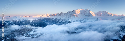 Mont Blanc Massif and Chamonix Valley at sunset in Winter French Alps photo
