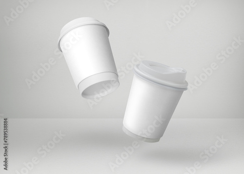 Coffee cup png transparent mockup on gray backdrop
