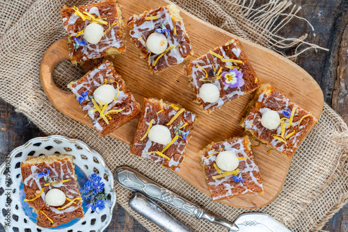 Lemon drizzle almond cake slces - overhead view photo