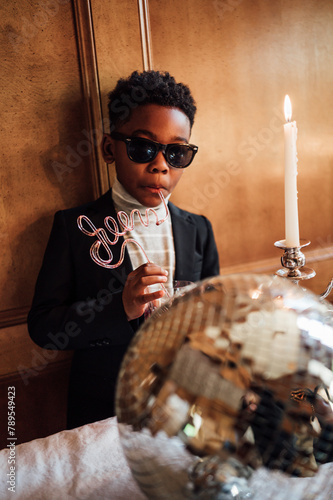 Young boy celebrating his birthday in style photo