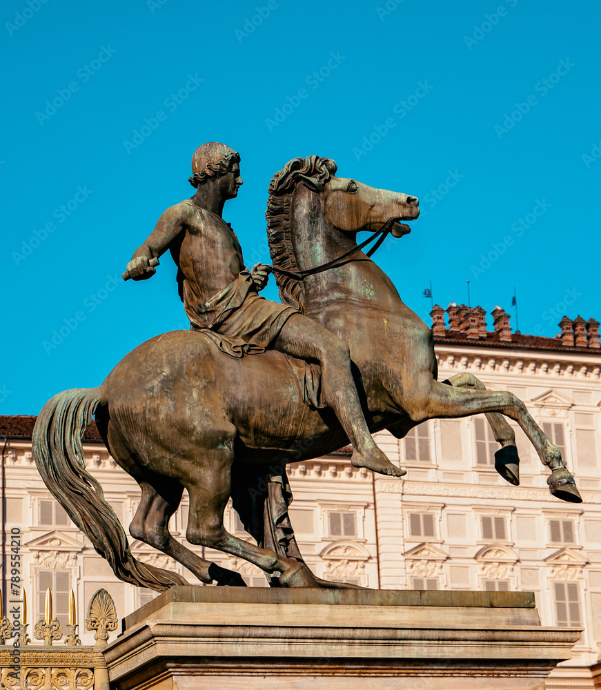 Famous statue in downtown Turin with blue sky