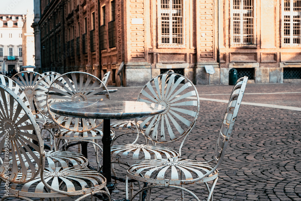 Empty restaurant table, downtown Turin