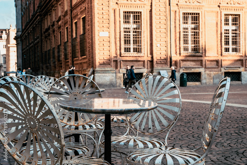 Empty restaurant table, downtown Turin