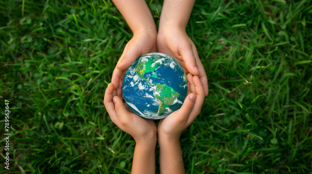 Children's hands hold the planet. Children's hands hold the planet.