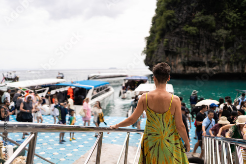 Tourist woman at ferry port. photo