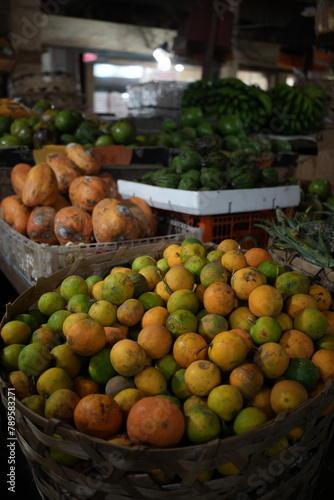 Abundance of Fresh Fruits at a Local Market Stall photo