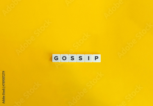 Gossip Word. Idle Talk or Rumor Concept. Text on block letters on bright orange background. Minimal aesthetics.