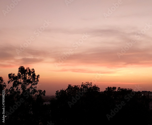 Beautiful sunset scenery view of colorful sky background, nature photography, silhouette of trees, dawn wallpaper