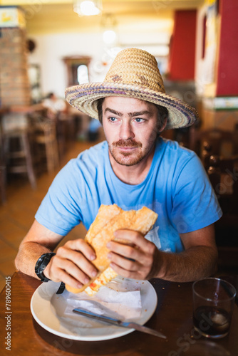 Excursionist man stoping for breakfast