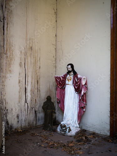 A religious icon in a doorway. photo